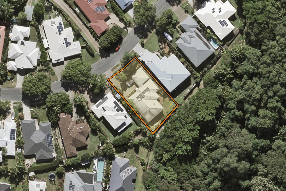 Aerial photo of 58 Old Orchard Drive, Palmwoods QLD 4555 with the lot boundary outlined in amber