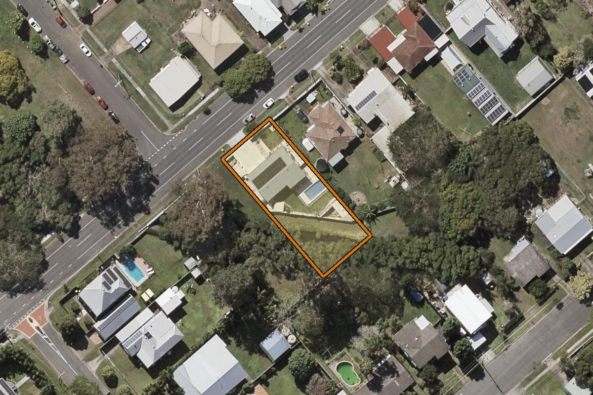 Aerial photo of 59 Loftus Street, Deagon QLD 4017 with the lot boundary outlined in amber