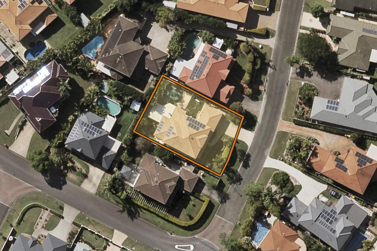 Aerial photo of 6 Carrington Place, Bridgeman Downs QLD 4035 with the lot boundary outlined in amber