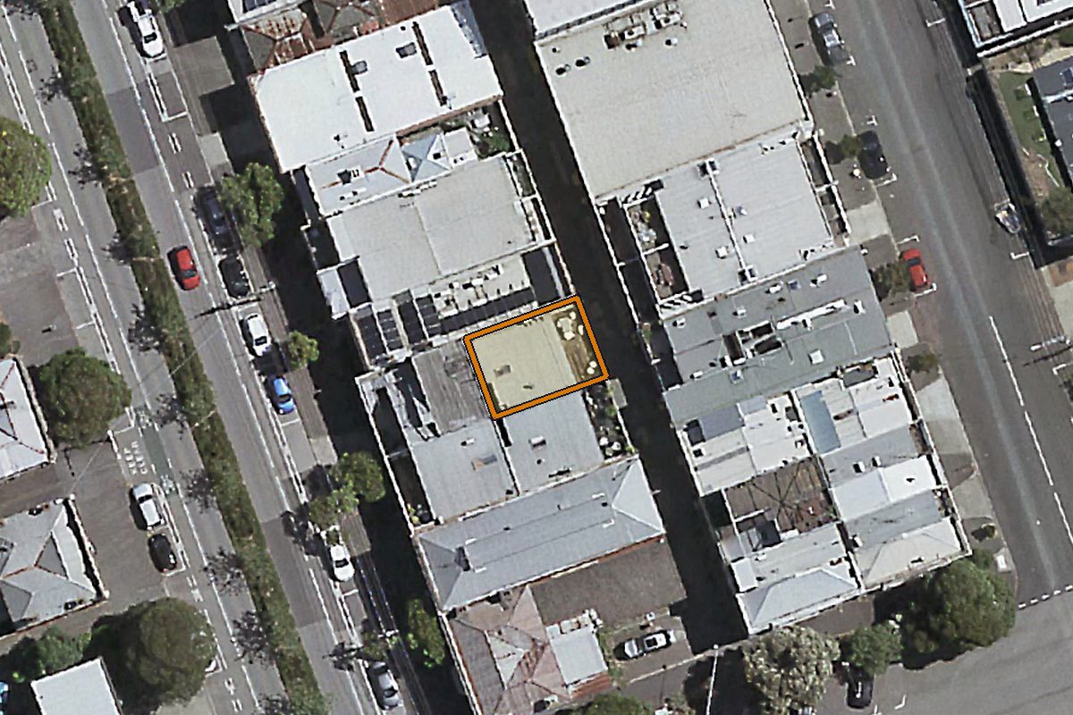 Aerial photo of 6 Emerald Way, South Melbourne VIC 3205 with the lot boundary outlined in amber