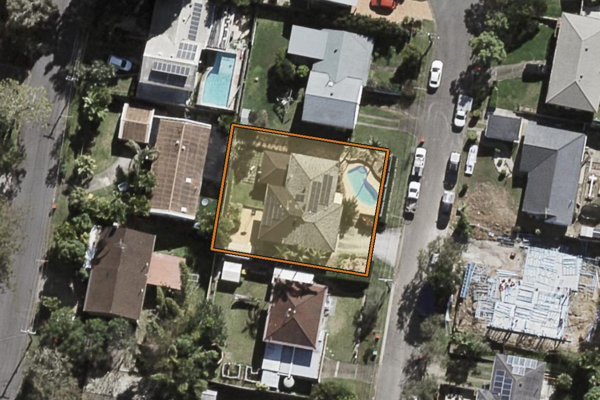 Aerial photo of 6 St Albans Street, Kenmore QLD 4069 with the lot boundary outlined in amber