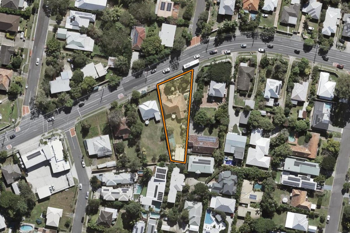 Aerial photo of 664 Waterworks Road, Ashgrove QLD 4060 with the lot boundary outlined in amber