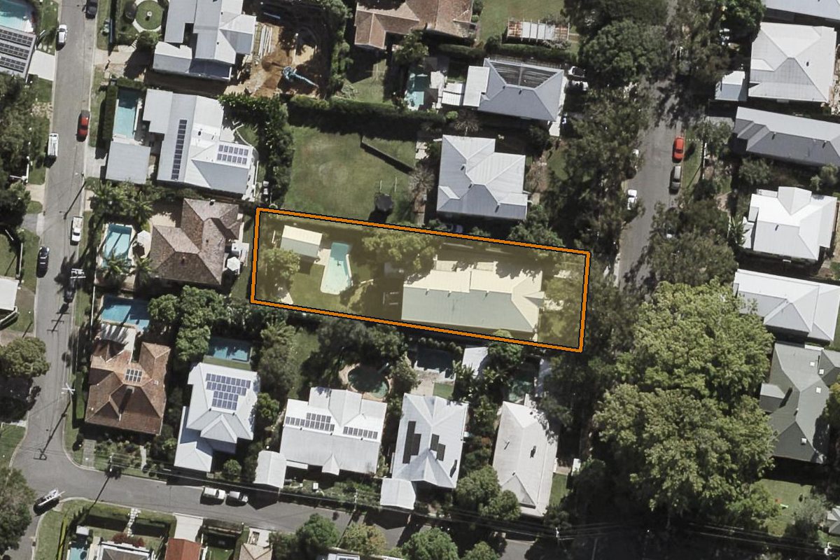 Aerial photo of 67 Laurel Avenue, Chelmer QLD 4068 with the lot boundary outlined in amber