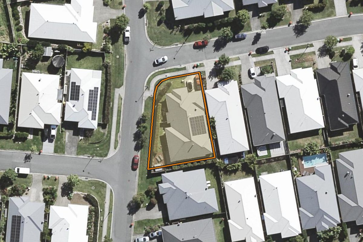 Aerial photo of 68 Hillstone Crescent, Maudsland QLD 4210 with the lot boundary outlined in amber