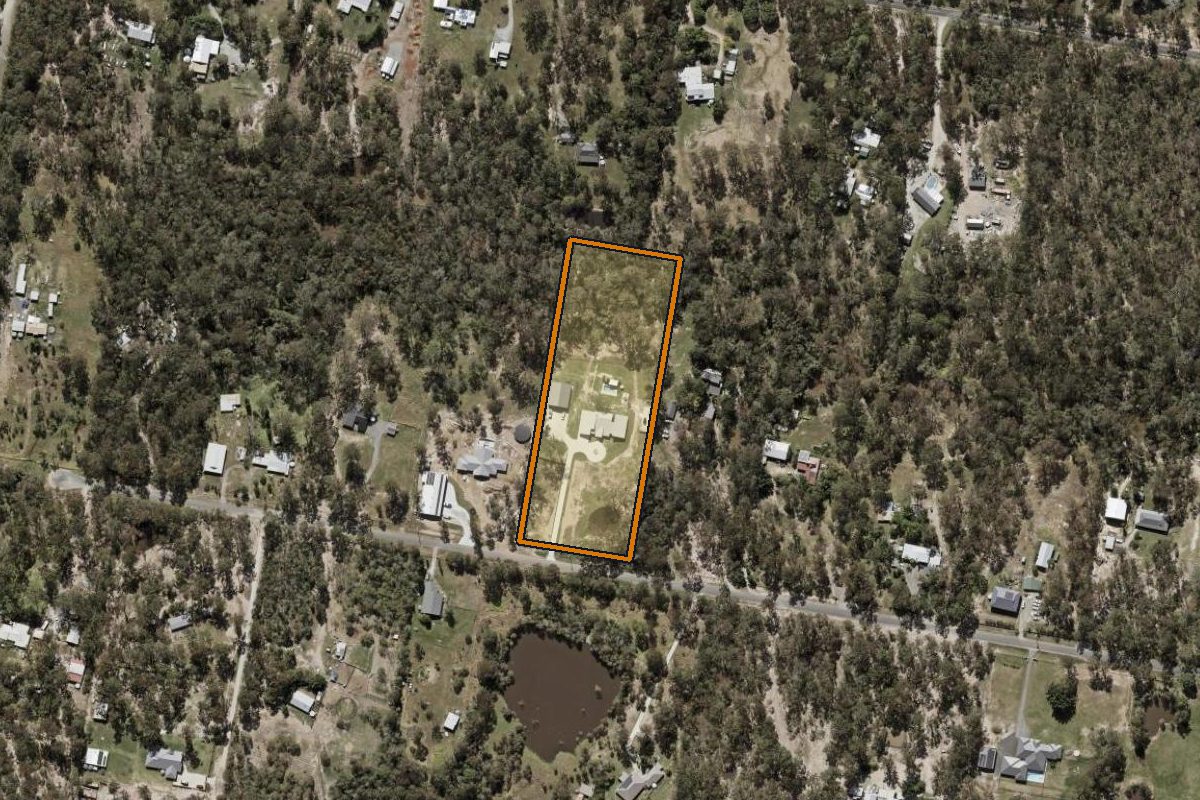 Aerial photo of 71-79 Pakenham Road, Greenbank QLD 4124 with the lot boundary outlined in amber