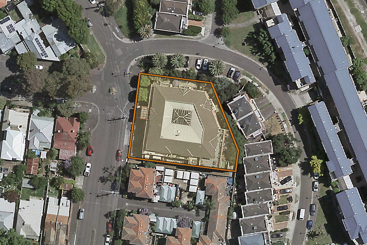Aerial photo of 72-88 Newmarket Street, Flemington VIC 3031 with the lot boundary outlined in amber