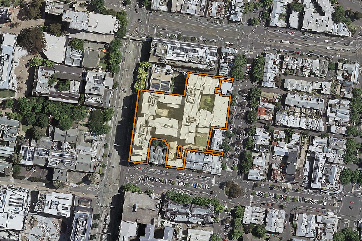 Aerial photo of 800 Swanston Street, Carlton VIC 3053 with the lot boundary outlined in amber