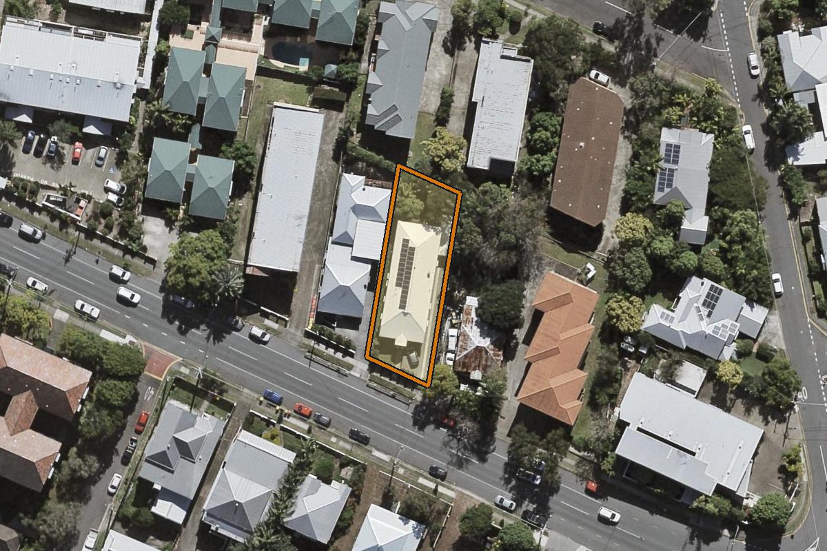 Aerial photo of 82 Herston Road, Kelvin Grove QLD 4059 with the lot boundary outlined in amber
