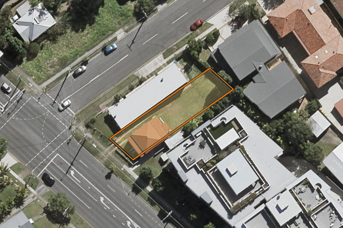 Aerial photo of 898 Logan Road, Holland Park West QLD 4121 with the lot boundary outlined in amber