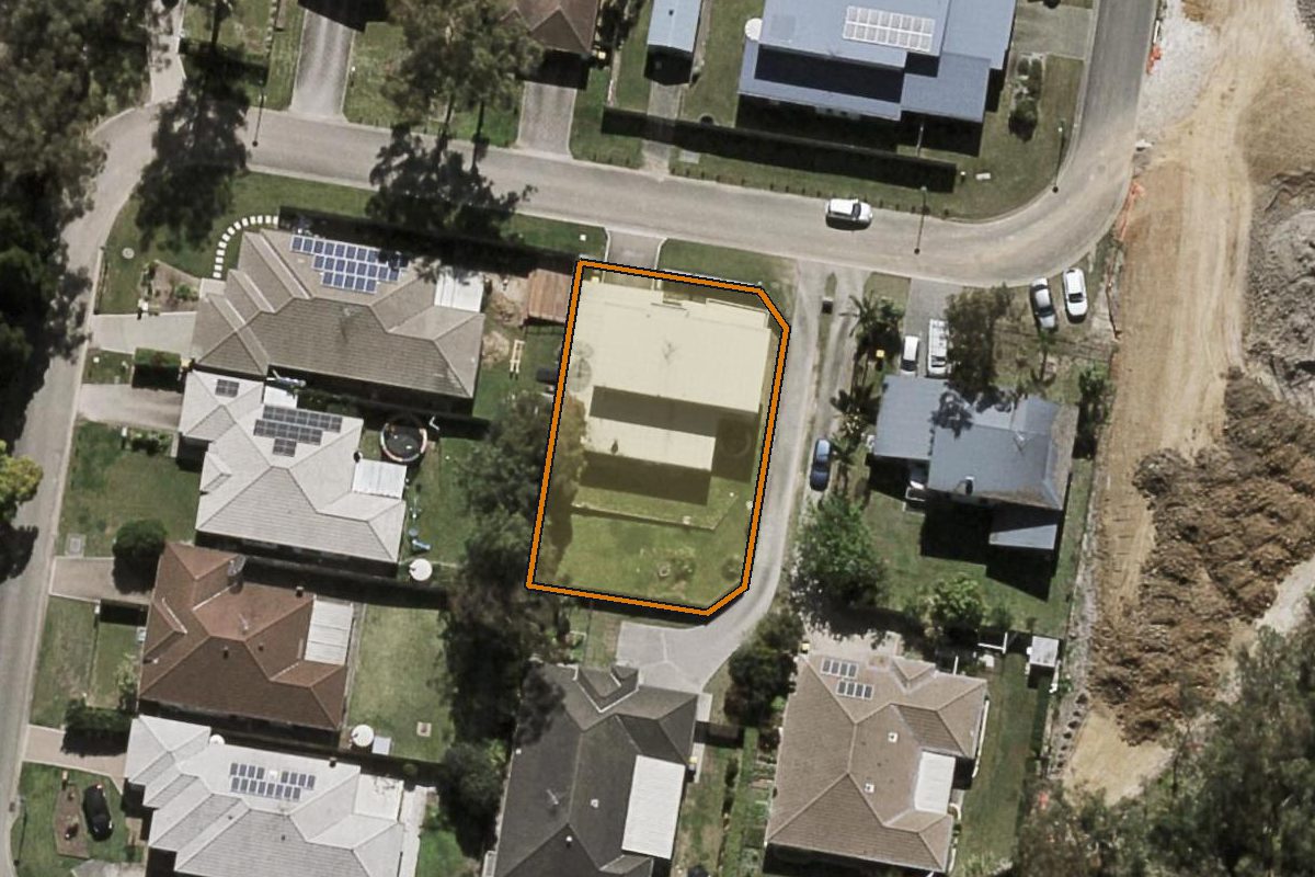Aerial photo of 9 Ayesha Place, Calamvale QLD 4116 with the lot boundary outlined in amber