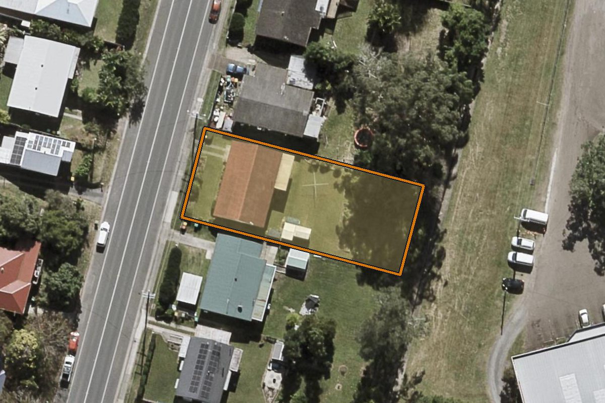 Aerial photo of 9 Coes Creek Road, Burnside QLD 4560 with the lot boundary outlined in amber