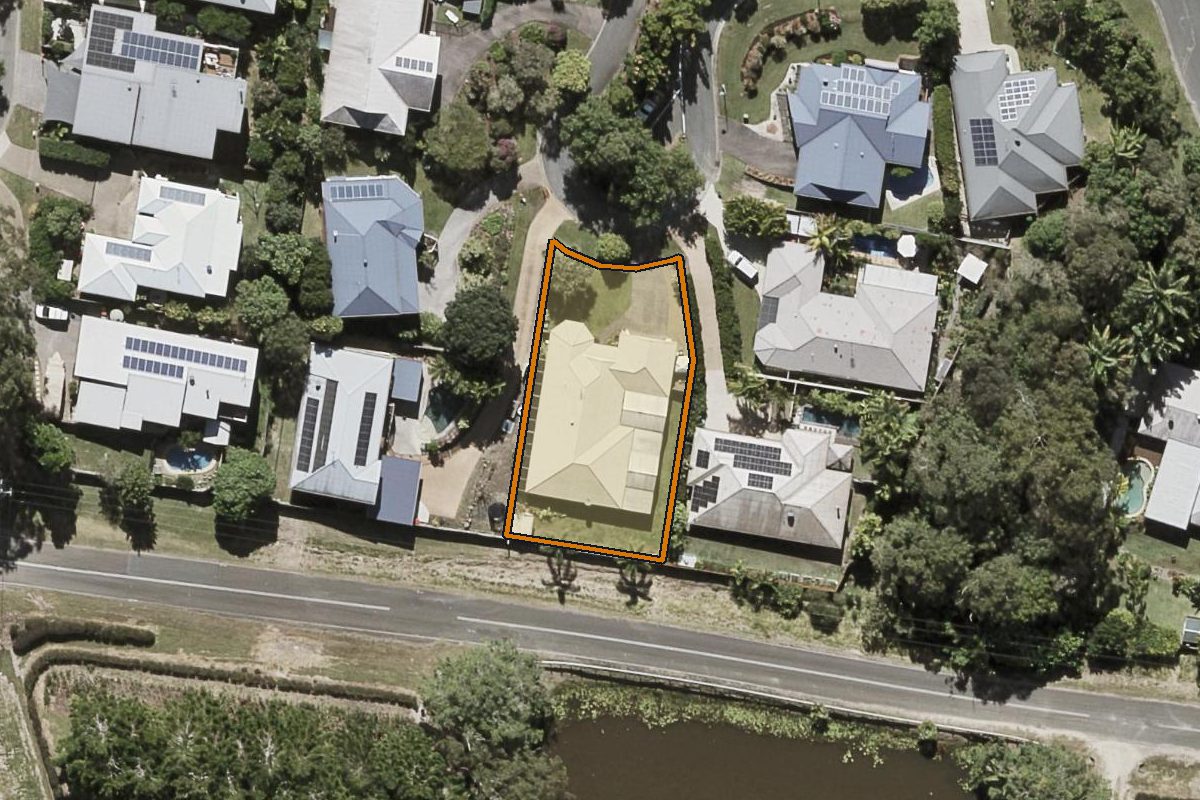 Aerial photo of 9 Crows Ash Court, Palmwoods QLD 4555 with the lot boundary outlined in amber