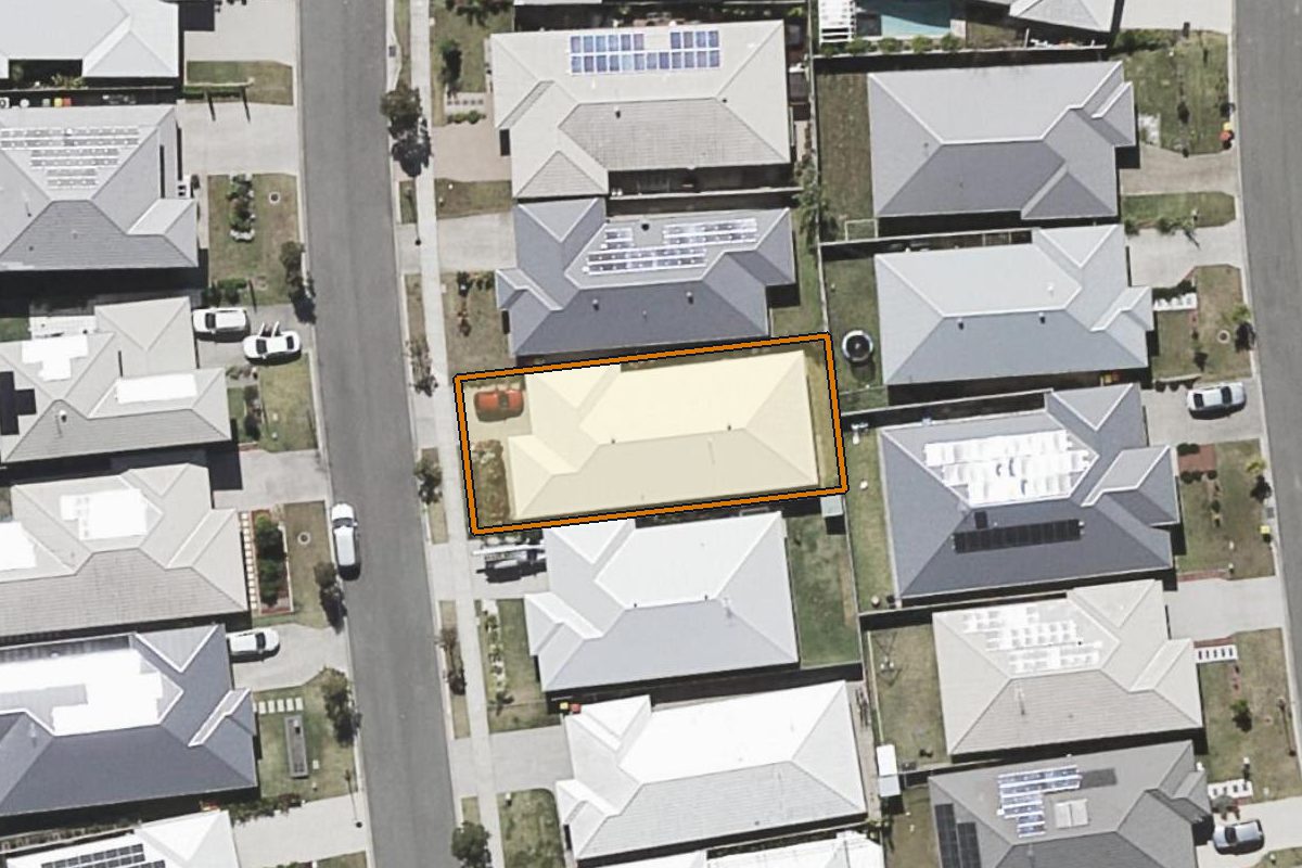 Aerial photo of 9 Edwards Road, Greenbank QLD 4124 with the lot boundary outlined in amber