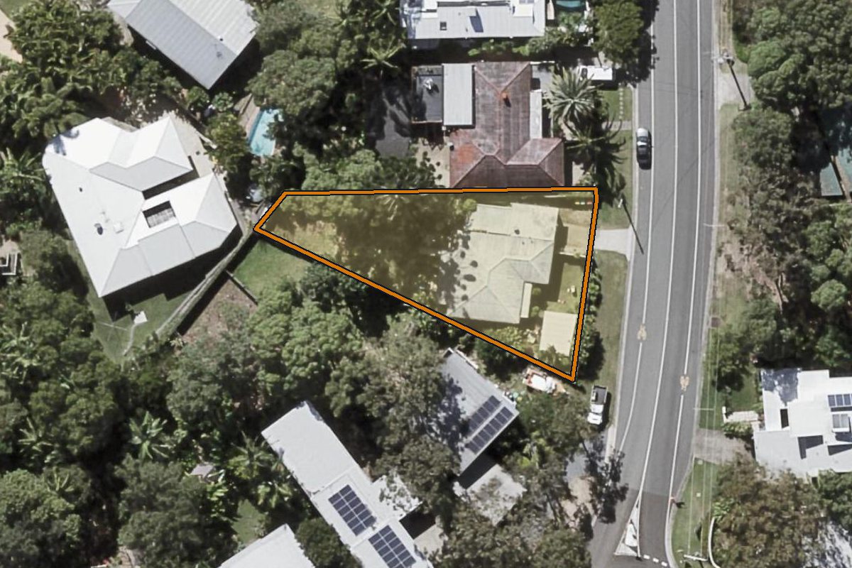 Aerial photo of 90 Centenary Heights Road, Coolum Beach QLD 4573 with the lot boundary outlined in amber
