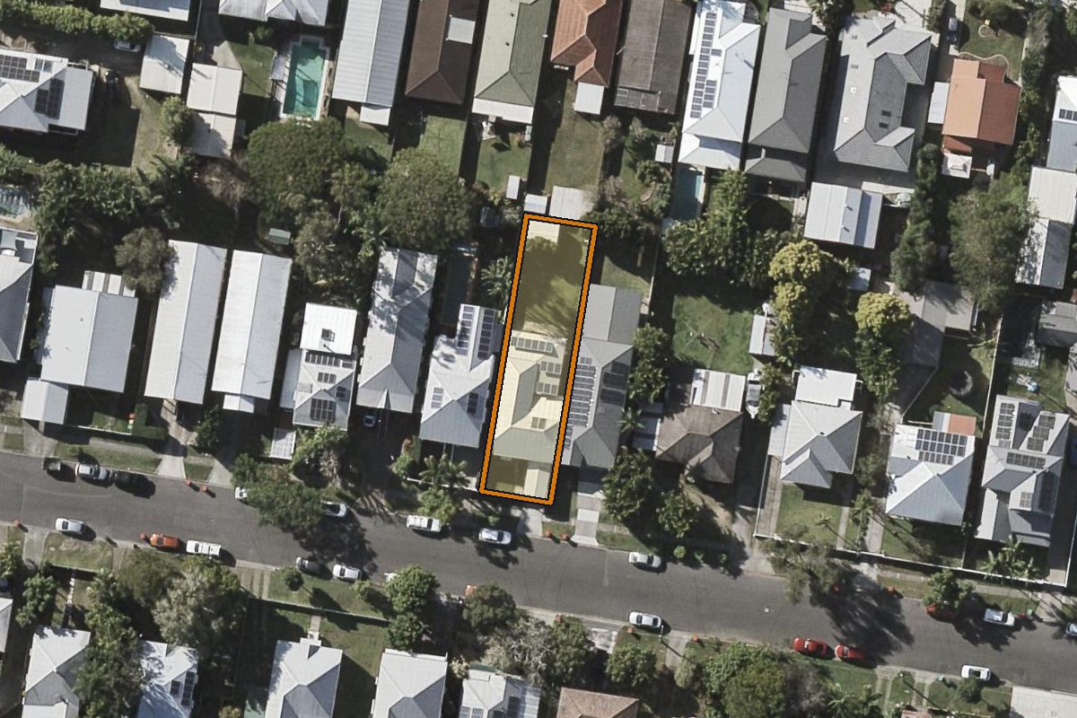Aerial photo of 95 Orchid Street, Enoggera QLD 4051 with the lot boundary outlined in amber