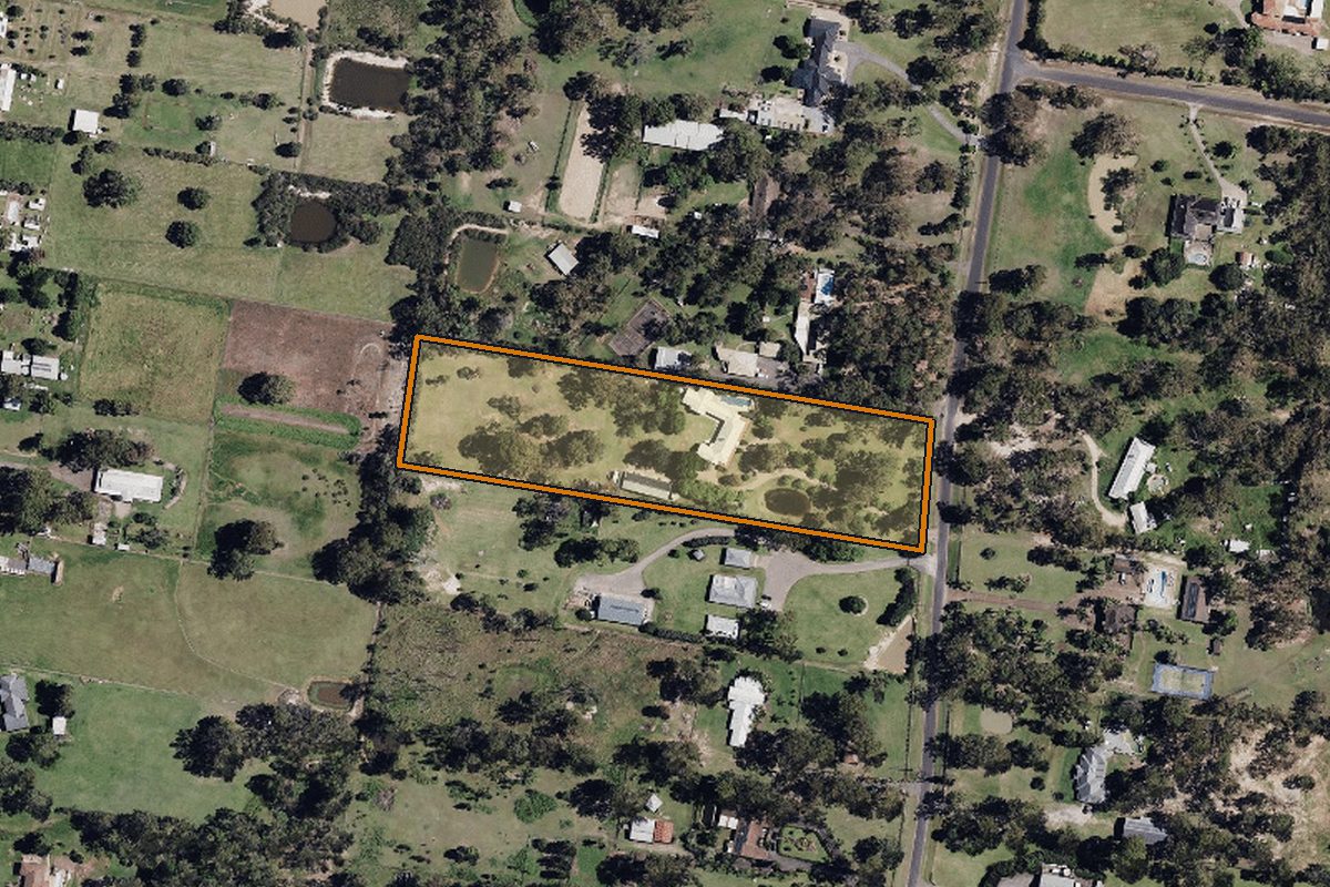 Aerial photo of 99-105 Sheredan Road, Castlereagh NSW 2749 with the lot boundary outlined in amber