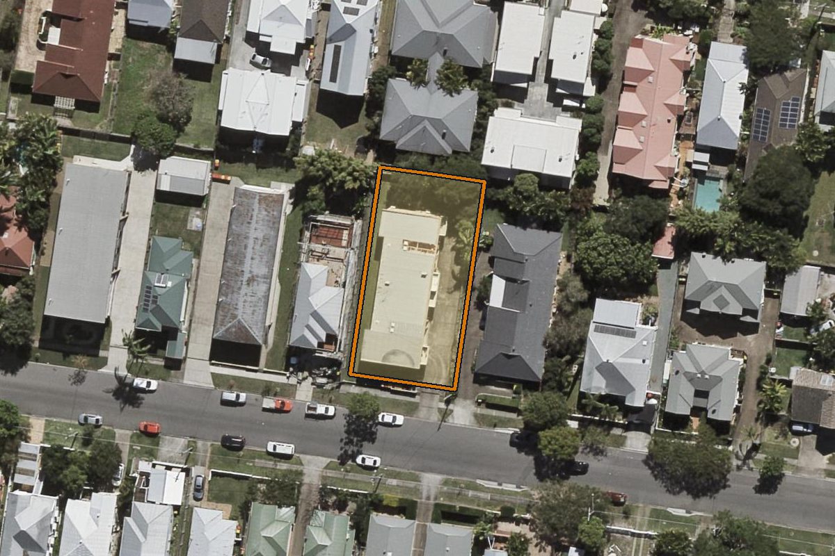 Aerial photo of 1/52 Vernon Street, Nundah QLD 4012 with the lot boundary outlined in amber