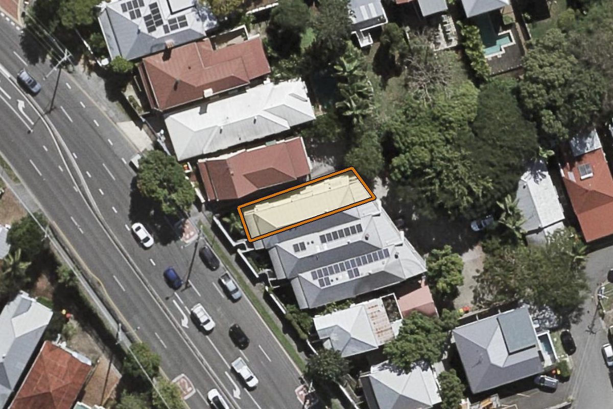 Aerial photo of 1/9A Waterworks Road, Red Hill QLD 4059 with the lot boundary outlined in amber