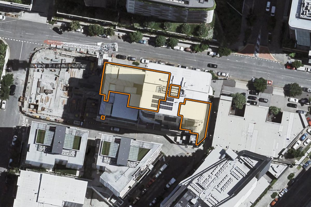Aerial photo of 1201/17 Longland Street, Newstead QLD 4006 with the lot boundary outlined in amber