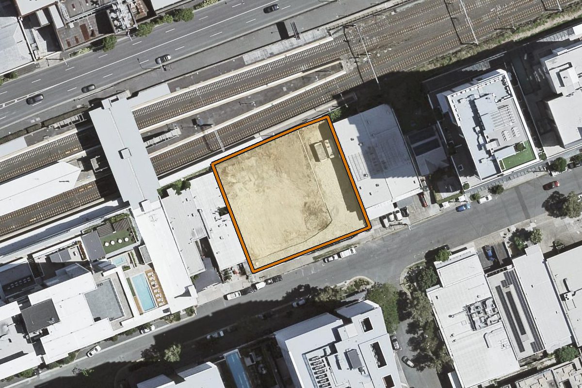 Aerial photo of 1401/33 Railway Terrace, Milton QLD 4064 with the lot boundary outlined in amber