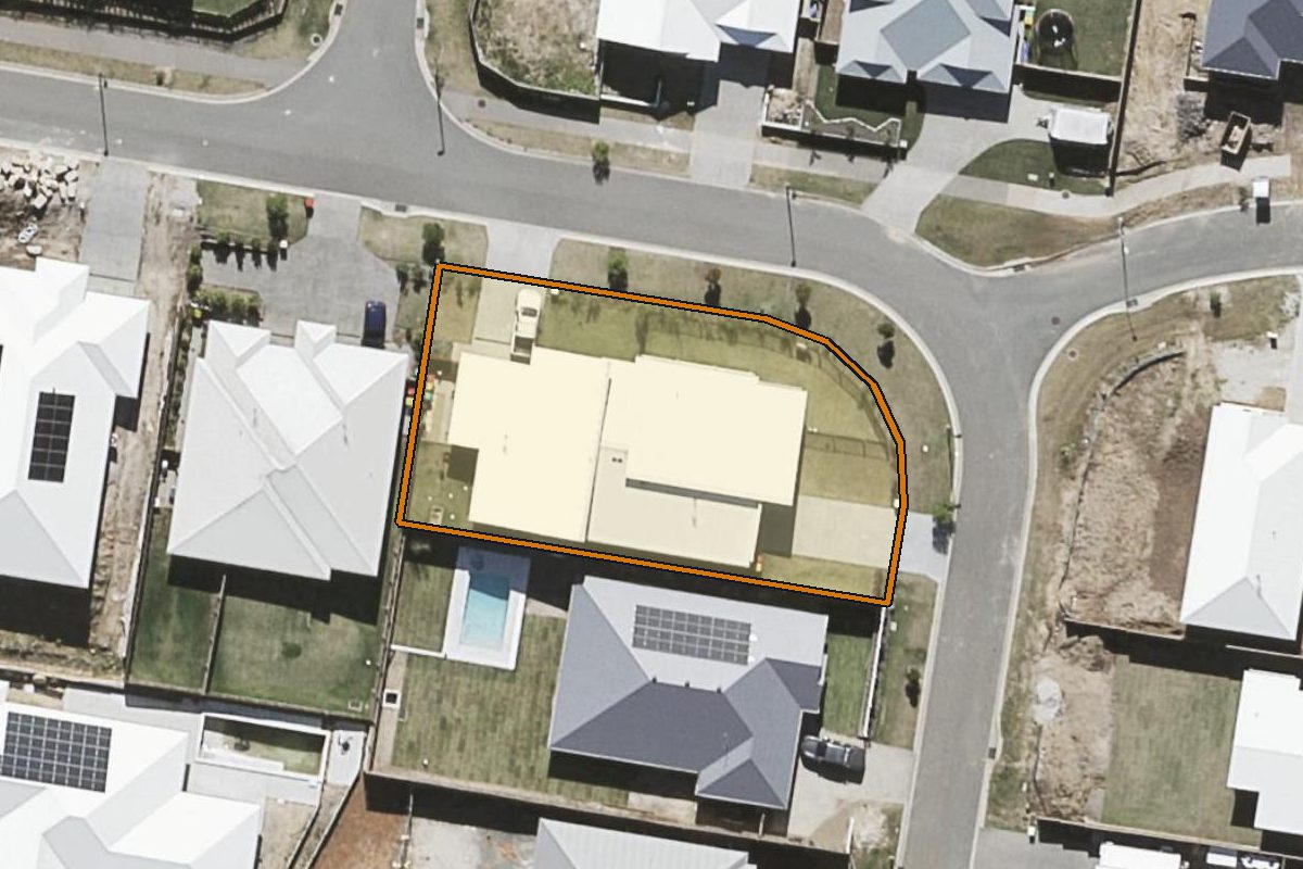 Aerial photo of 2/10 Dray Place, Palmwoods QLD 4555 with the lot boundary outlined in amber