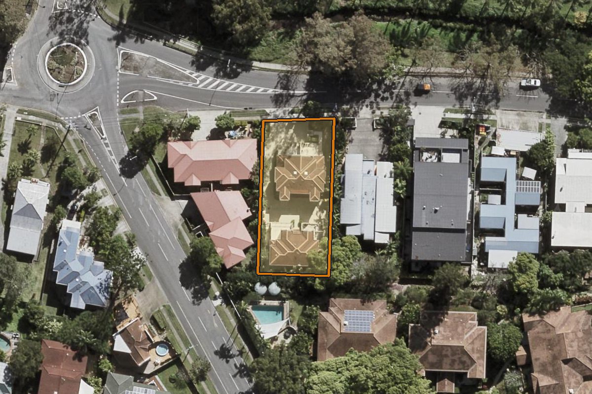 Aerial photo of 2/7 Indooroopilly Road, Taringa QLD 4068 with the lot boundary outlined in amber