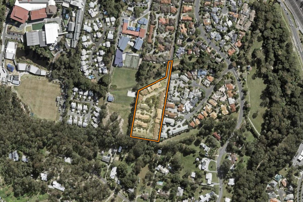 Aerial photo of 20/1 Bridgman Drive, Reedy Creek QLD 4227 with the lot boundary outlined in amber