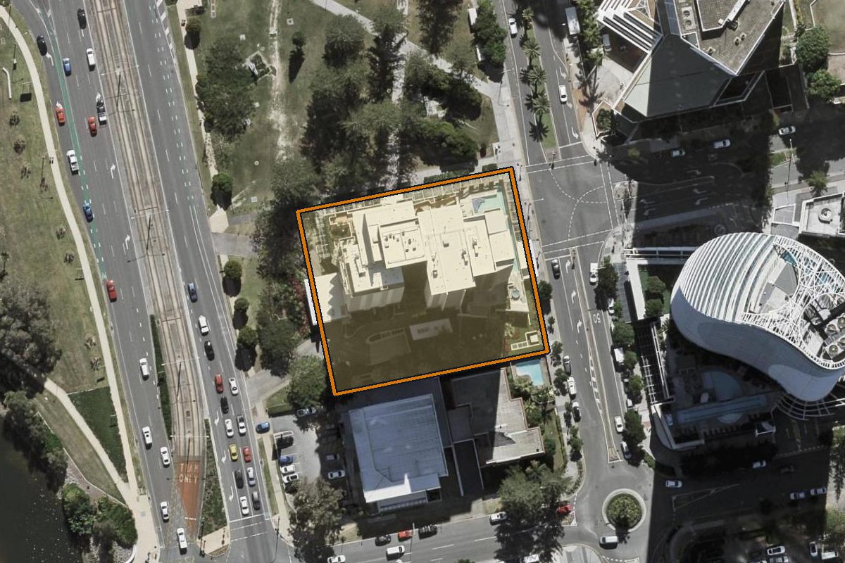 Aerial photo of 2001/2685 Gold Coast Highway, Broadbeach QLD 4218 with the lot boundary outlined in amber