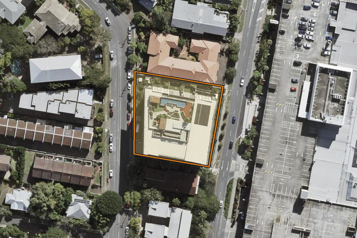 Aerial photo of 202/125 Station Road, Indooroopilly QLD 4068 with the lot boundary outlined in amber