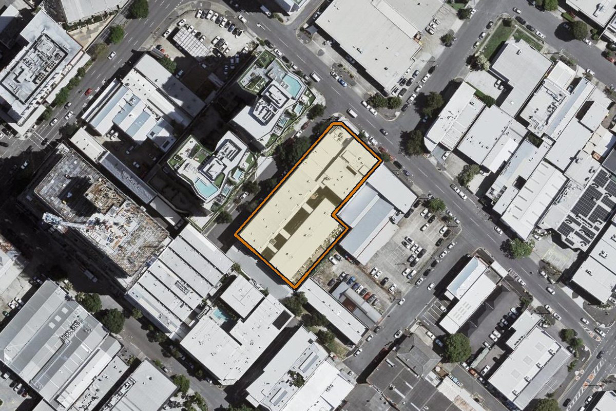 Aerial photo of 306/1 Ella Street, Newstead QLD 4006 with the lot boundary outlined in amber