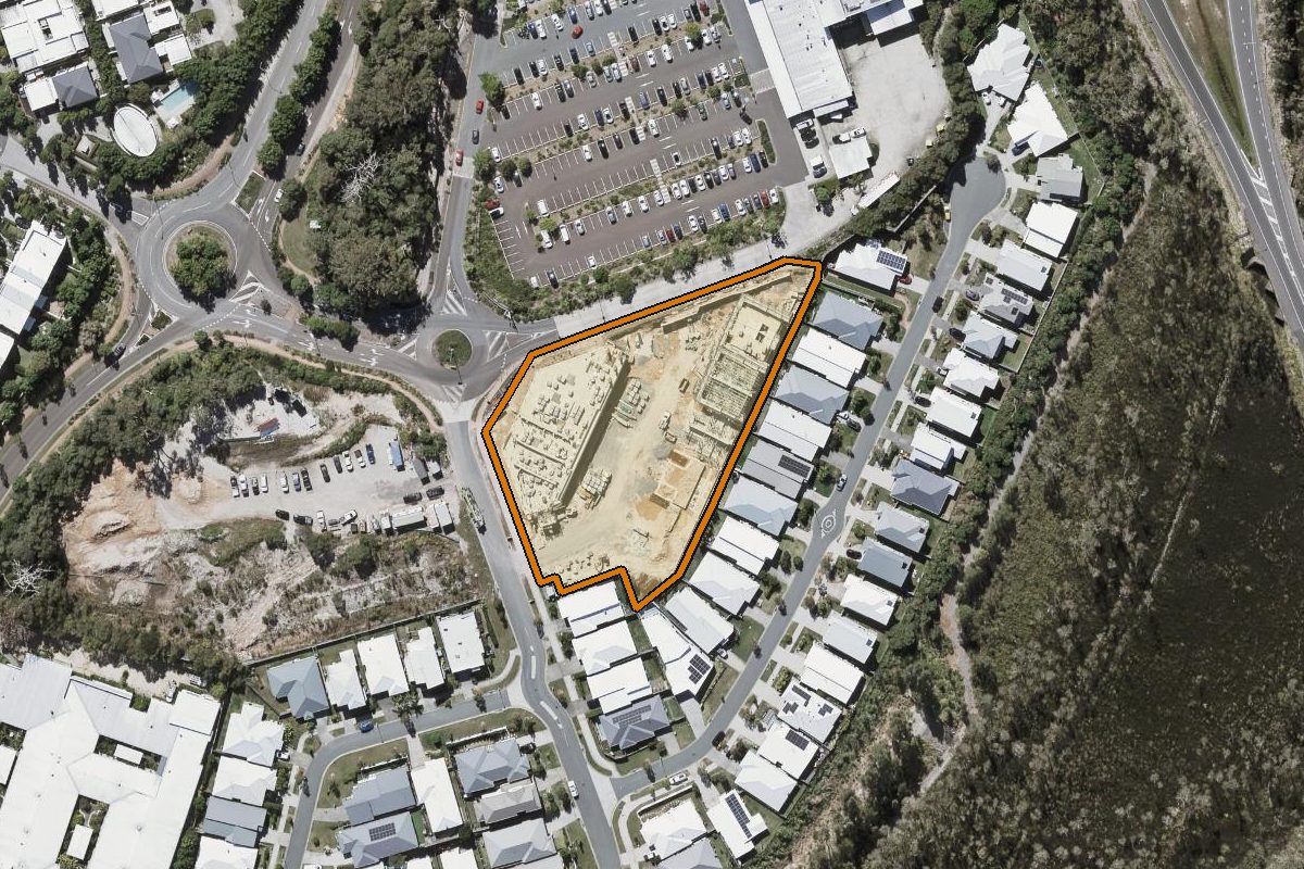 Aerial photo of 4/9 Koel Circuit, Peregian Springs QLD 4573 with the lot boundary outlined in amber