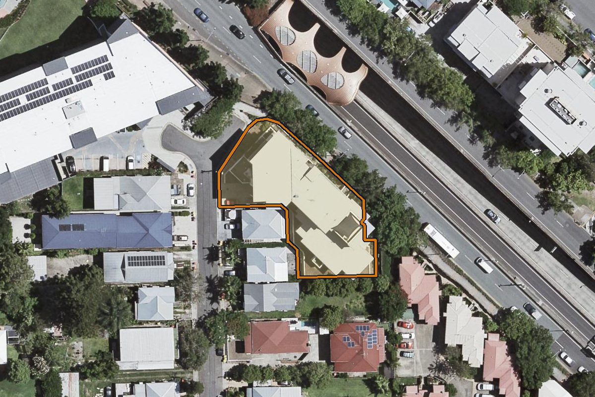 Aerial photo of 404/37 Connor Street, Kangaroo Point QLD 4169 with the lot boundary outlined in amber