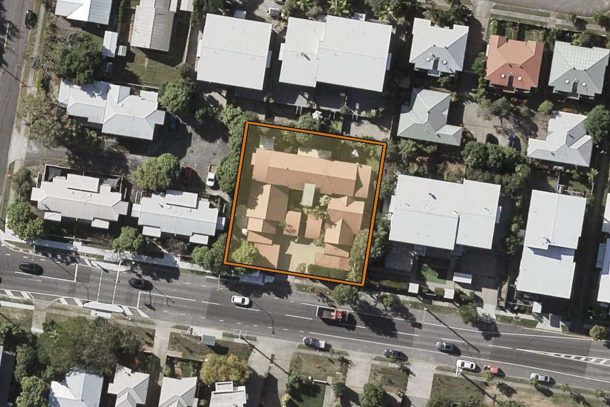Aerial photo of 6/219 Pickering Street, Enoggera QLD 4051 with the lot boundary outlined in amber