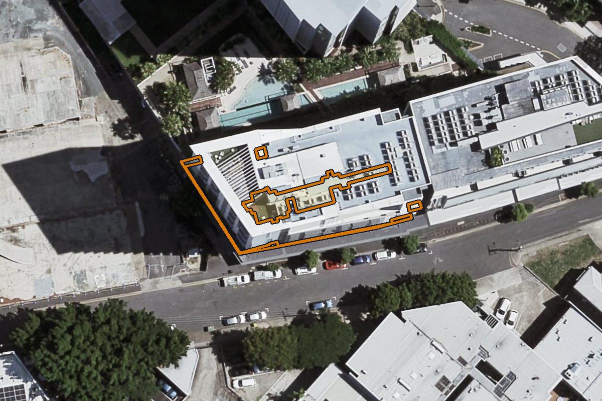 Aerial photo of 603/338 Water Street, Fortitude Valley QLD 4006 with the lot boundary outlined in amber