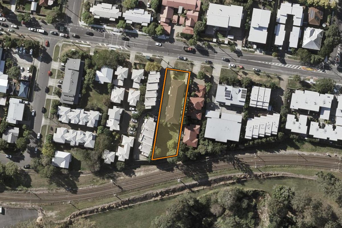 Aerial photo of 8/214 Pickering Street, Enoggera QLD 4051 with the lot boundary outlined in amber