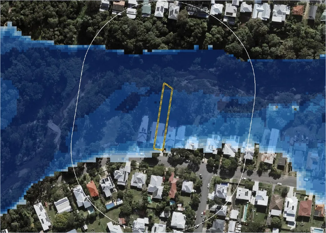 Modelled flood depth over aerial imagery with a property boundary outlined