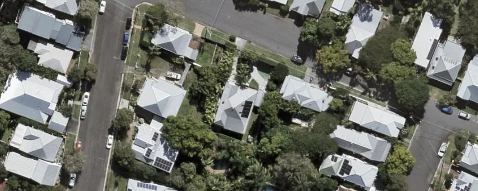 Aerial photo of a hillside property in Red Hill, Brisbane
